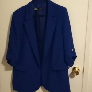 Quarter length sleeve blazer